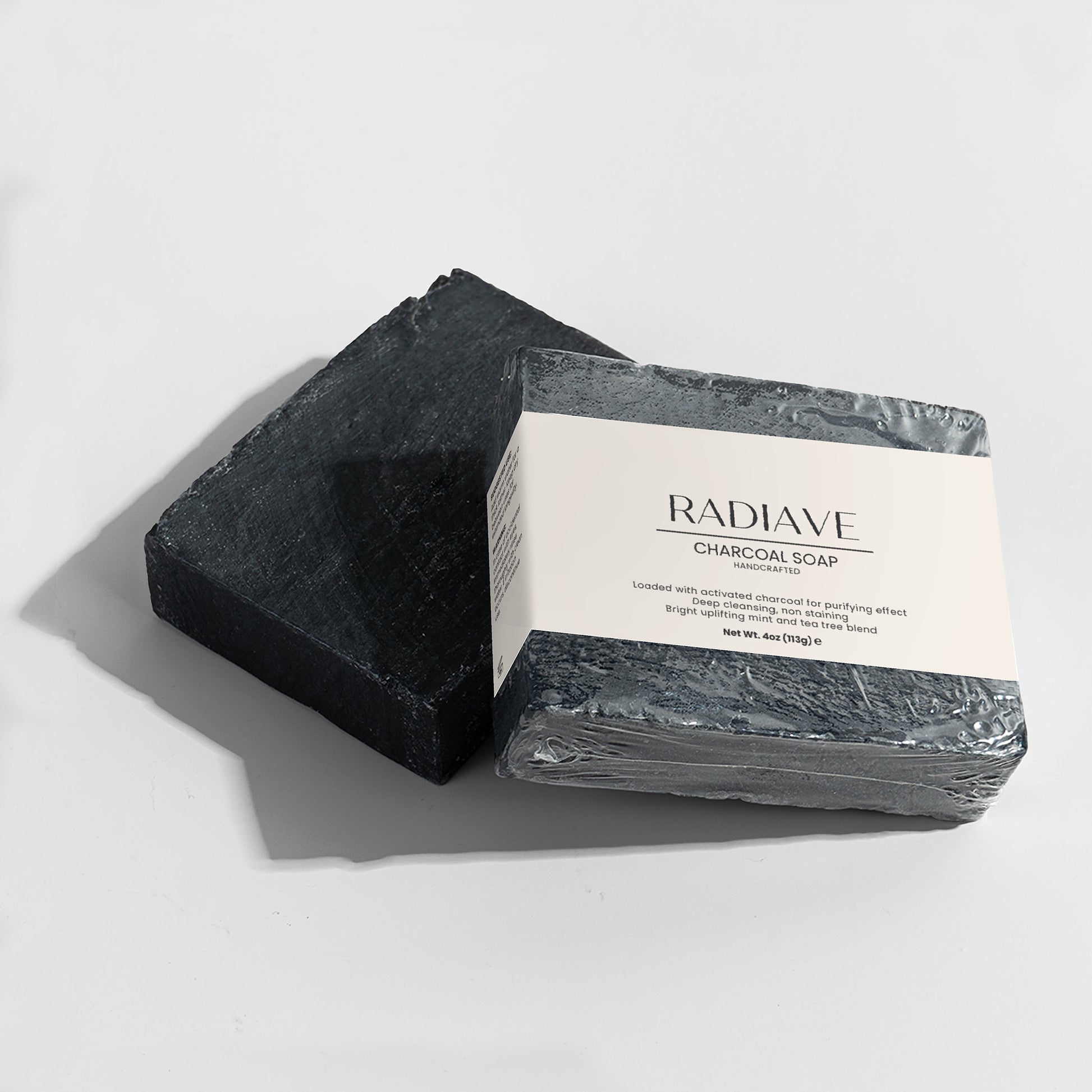 Radiave charcoal soap on a white background