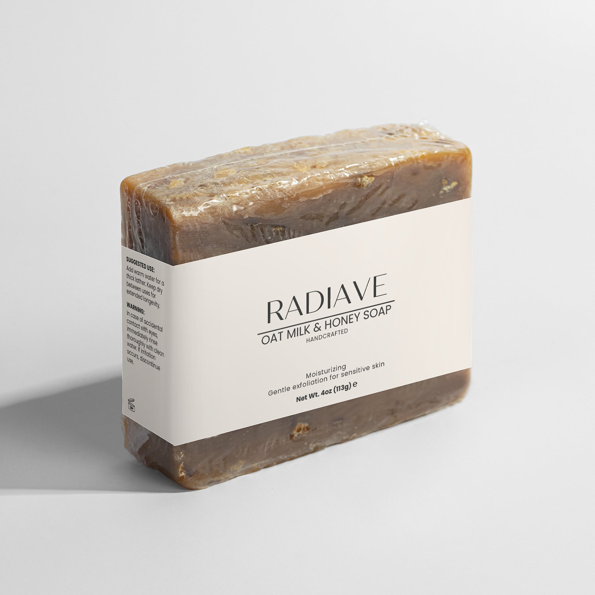 Radiave oat milk and honey soap bar on a light gray background