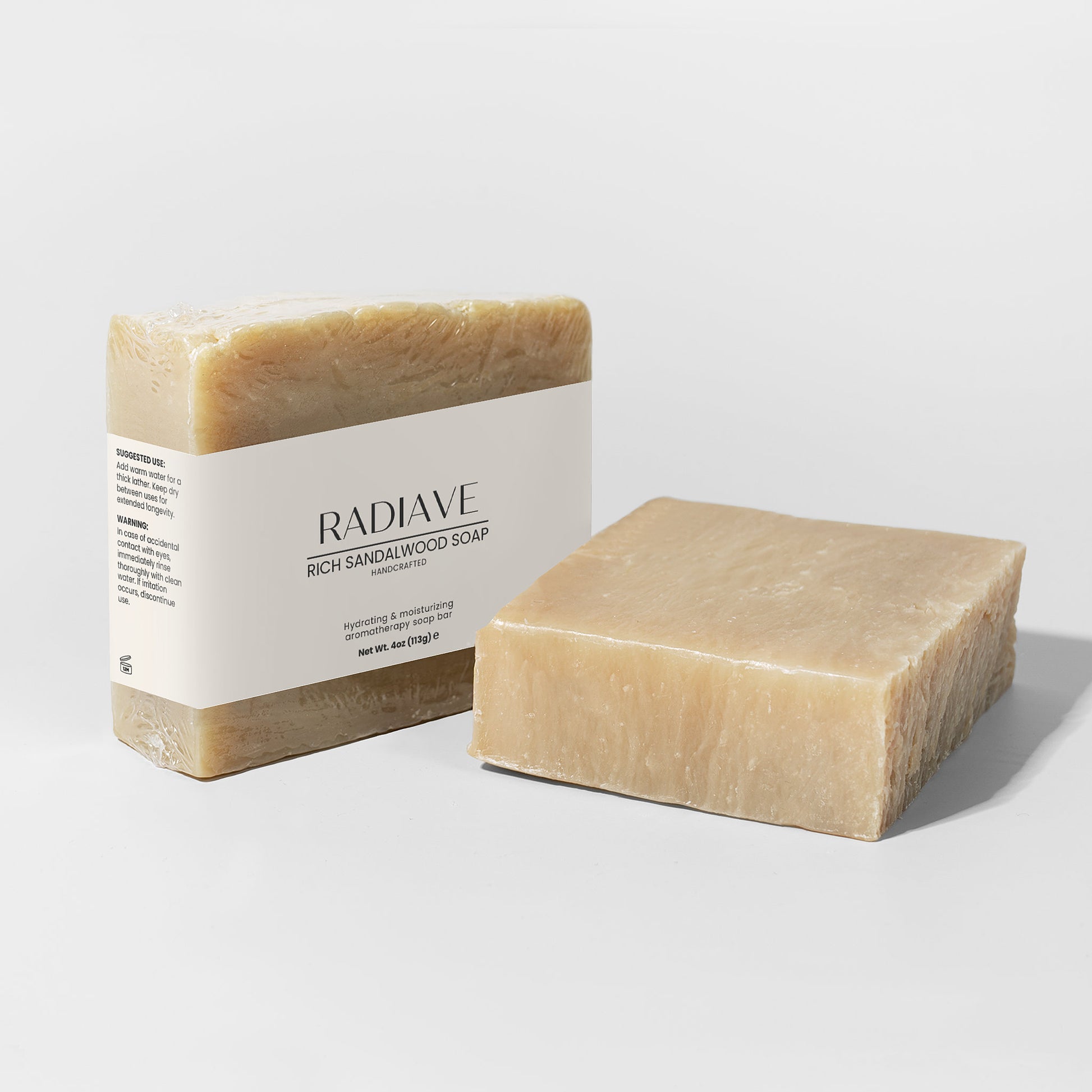 Radiave soap bar with packaging on a light gray background